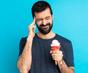 چرا بعد خوردن بستنی سردرد میگیریم؟